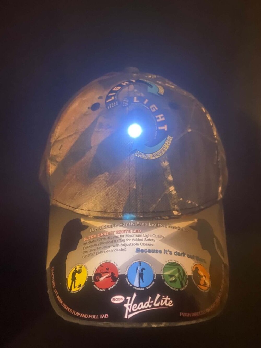 Camo Headlight Cap Ultra Bright White LED Light on cap.